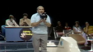 Ed Asner and Gail Fisher vs. John Davidson ad Peggy Lennon