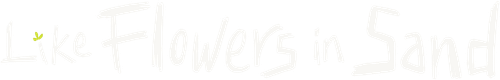 Like Flowers in Sand logo